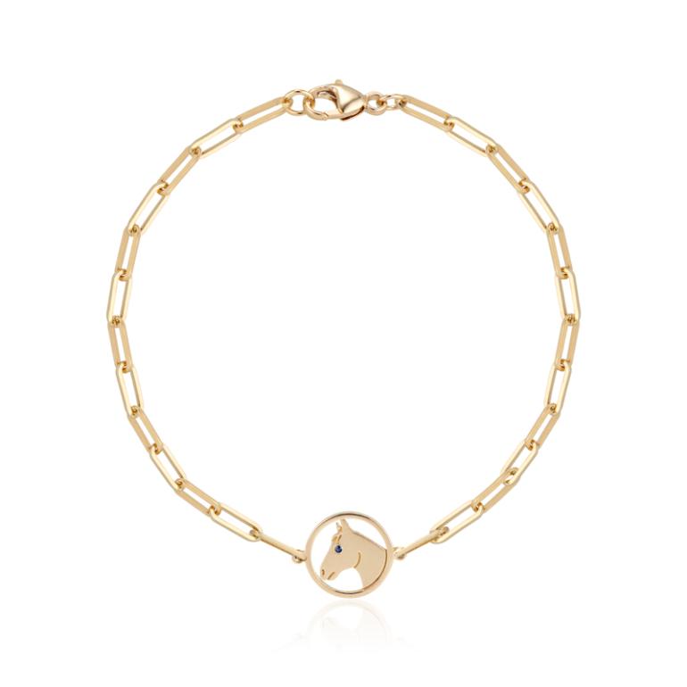 Horse bracelet in 18k gold with sapphire, $1,425; Aurelia Demark